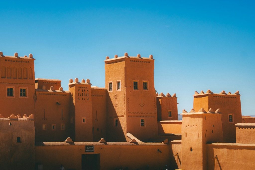 Ancient earthen fortress under a clear blue sky