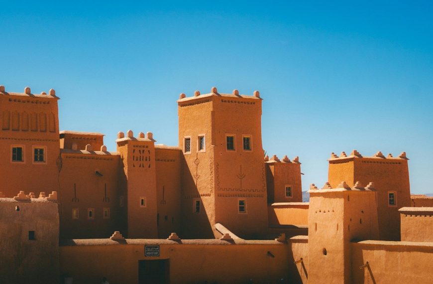 Ancient earthen fortress under a clear blue sky