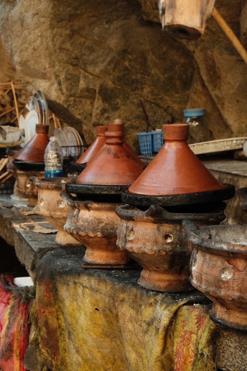 A group of clay pots sitting on top of a table